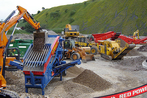 Machinery excavating aggregates in a quarry